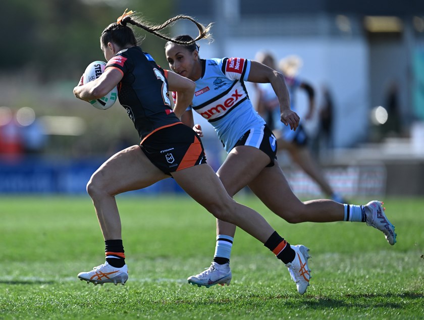 Whitfeld on the run against the Sharks