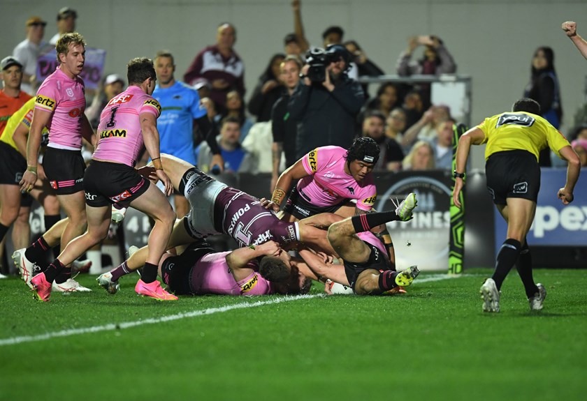 There it is...full-back Reuben Garrick stretches out to get the ball down against the Panthers.