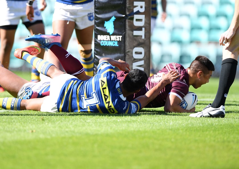 Gordon Chan Kum Tong darts over for a try in the 2018 Harold Matthews Cup Grand Final