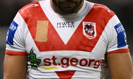 St George Dragons rugby players covered the NRL logo during a match last month in protest over the pay dispute.