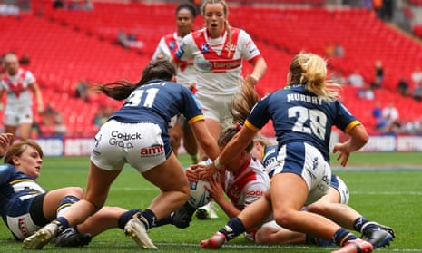 Tara Jones fights to put the ball down to open the scoring for St Helens in the Women’s Challenge Cup Final against Leeds.