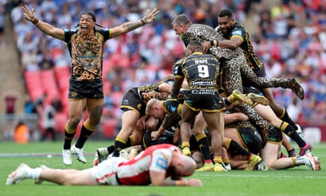 Leigh owner Derek Beaumont joins in with the players’ celebration