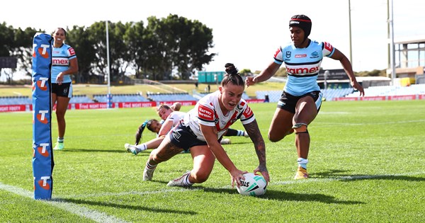 Roosters' Fressard Hat-Trick Soars, Sharks Left in Shambles