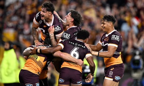 Broncos players celebrate following a try by Billy Walters during the NRL preliminary final against the New Zealand Warriors at Brisbane’s Suncorp Stadium.