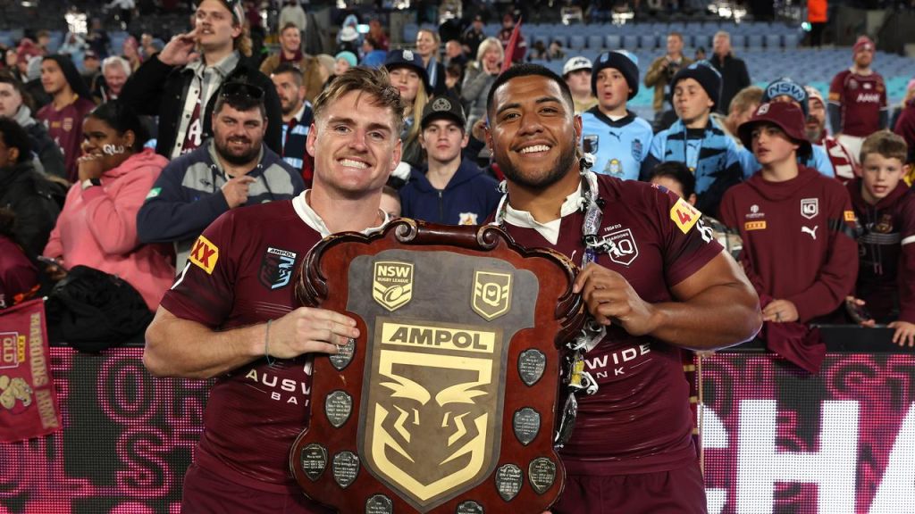 Moeaki Fotuaika celebrated an Origin series win with Titans teammate AJ Brimson. Picture: Mark Kolbe/Getty Images