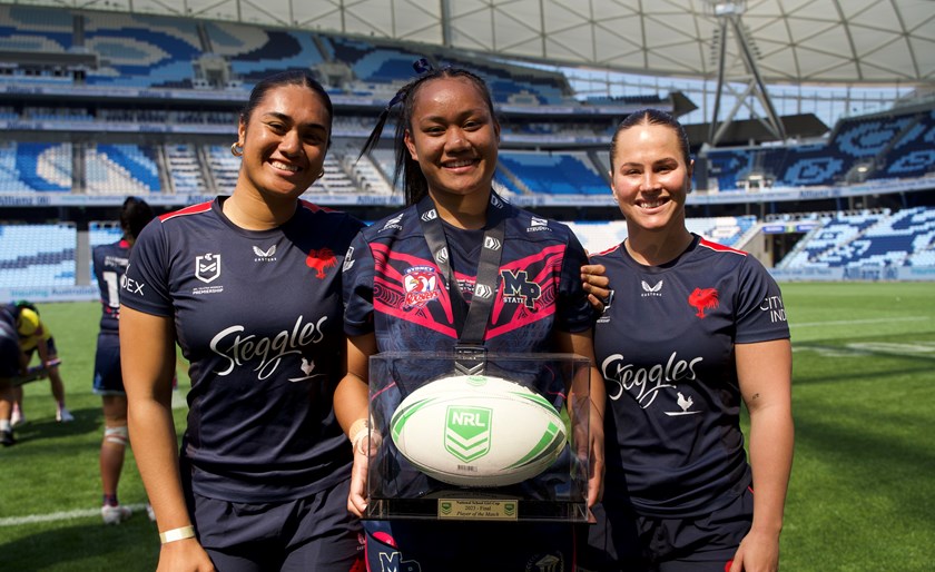 Mabel Park SHS Alumni Otesa Pule and Keilee Joseph presented Athena Vili with the Player of the Match award.