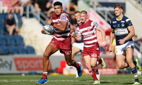 Kai Pearce-Paul breaks away to score one of Wigan’s nine tries.