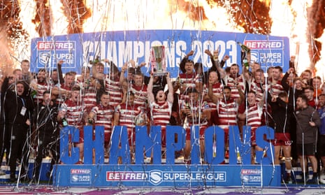 Wigan celebrate after their Grand Final win over Catalans.