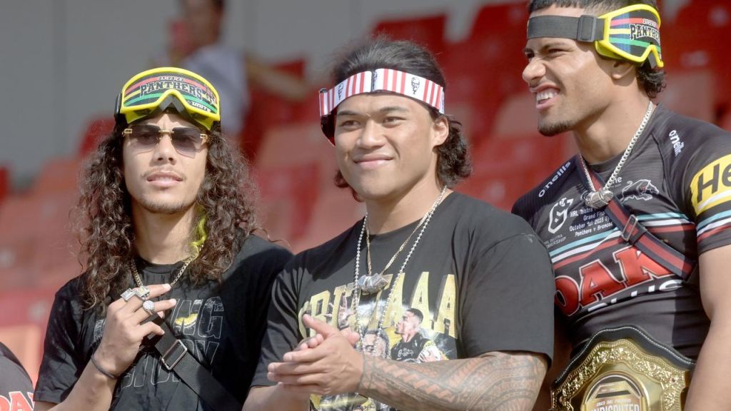 Jarome Luai, Brian To’o and Stephen Crichton celebrate with Penrith fans.