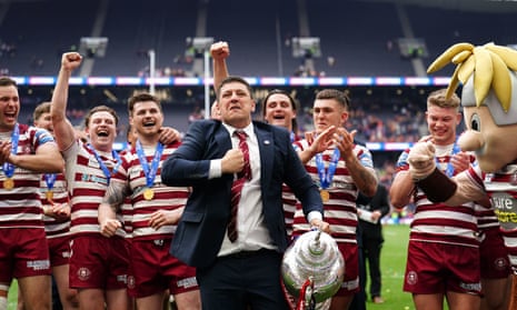 Matt Peet celebrates with Wigan Warriors players at last year's Challenge Cup final