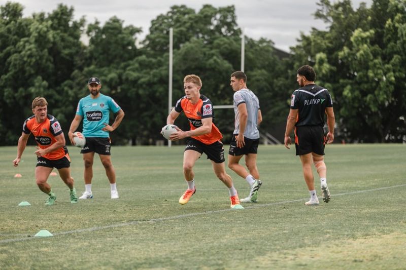 Benji Marshall observing Lachie Galvin and Will Craig