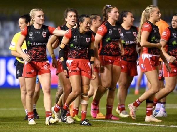 The Dragons celebrate a Tyla Nathan-Wong try in their inaugural NRLW local derby clash against the Sharks.