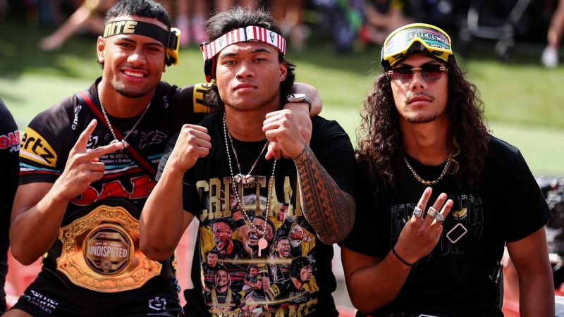 Jarome Luai (right) with Penrith teammates Stephen Crichton and Brian To’o after a third straight premiership win. Picture: NRL Photos