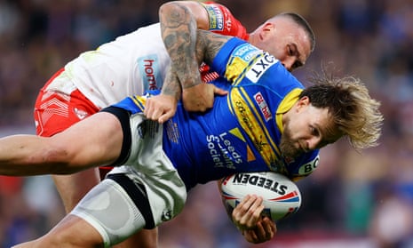 Curtis Sironen of St Helens tackles Blake Austin of Leeds Rhinos during the Super League Grand Final