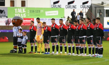 Dunfermline Athletic FC during the pre-match minutes silence for Remembrance dayon 10 November 2023.