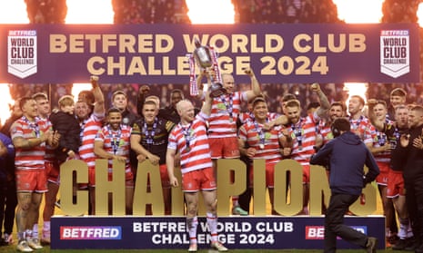 Wigan Warriors celebrate beating Penrith Panthers in the World Club Challenge.