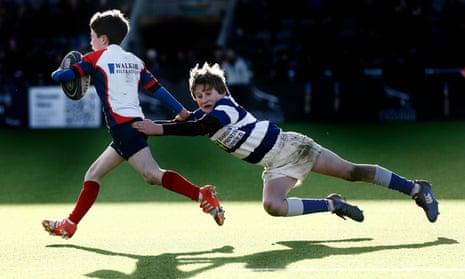 Under-11s playing rugby