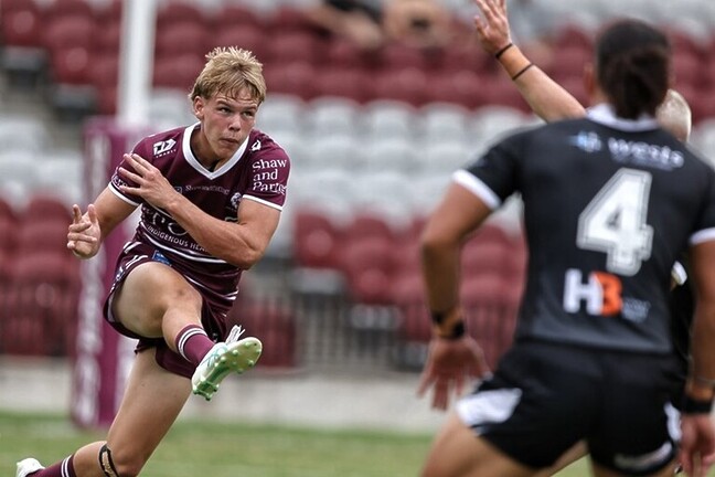 Big boot....Manly five-eighth Charlie Boyle kicks downfield