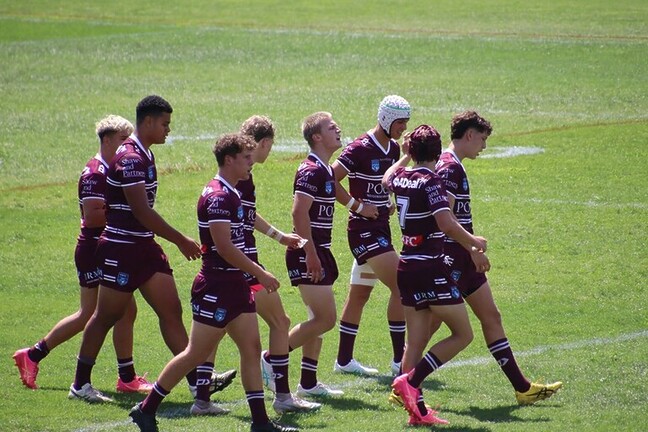 Going well...the Sea Eagles walk back after scoring one of their four tries