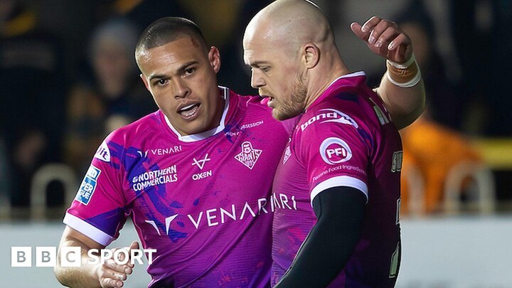 Adam Swift and Tui Lolohea celebrate a Huddersfield try