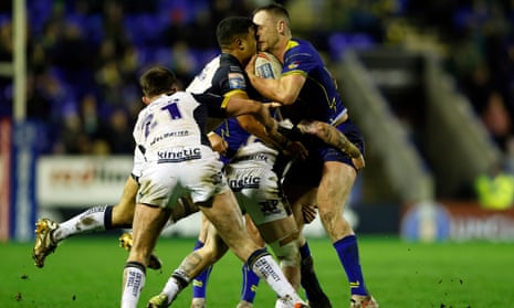 Warrington's Nu Brown and Hull FC's Ben Currie clash heads during their Super League match last month