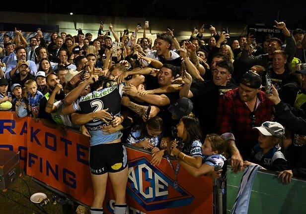 Sharks rookie Sam Stonestreet is mobbed by his friends and family following Sunday's NRL debut.