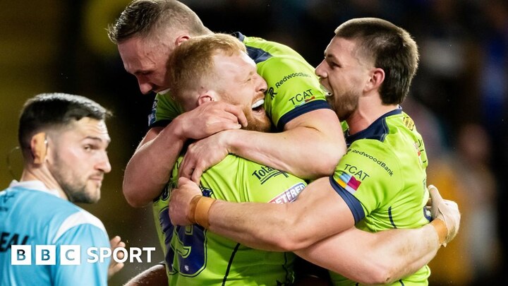 Joe Bullock celebrates a try for Warrington before half-time