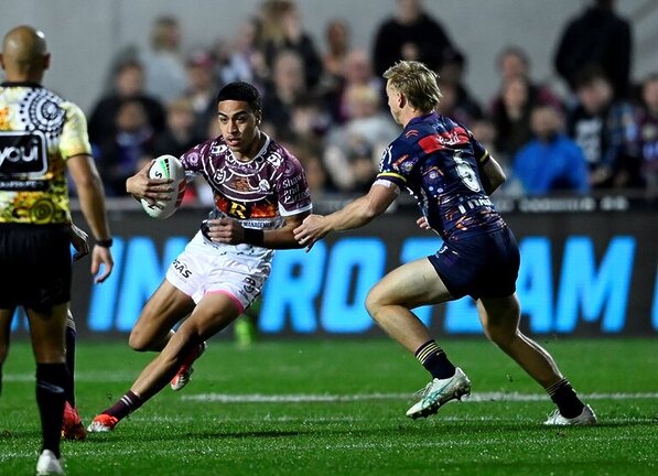 Right at home...Lehi Hopoate takes on the Storm in his superb NRL debut