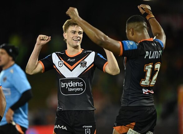 Tigers roar to victory over Raiders in NRL clash