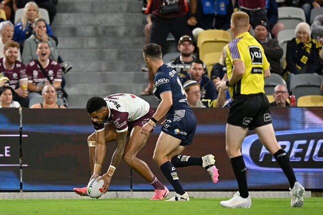 Jason Saab crosses for his first try against the Cowboys