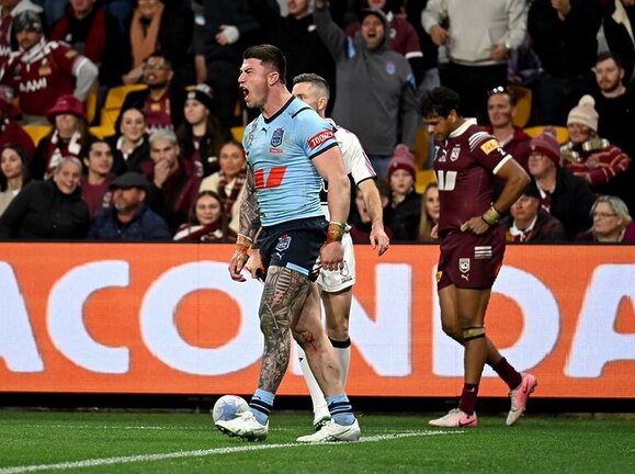 Bradman Best celebrates his try in Wednesday night's State of Origin victory.