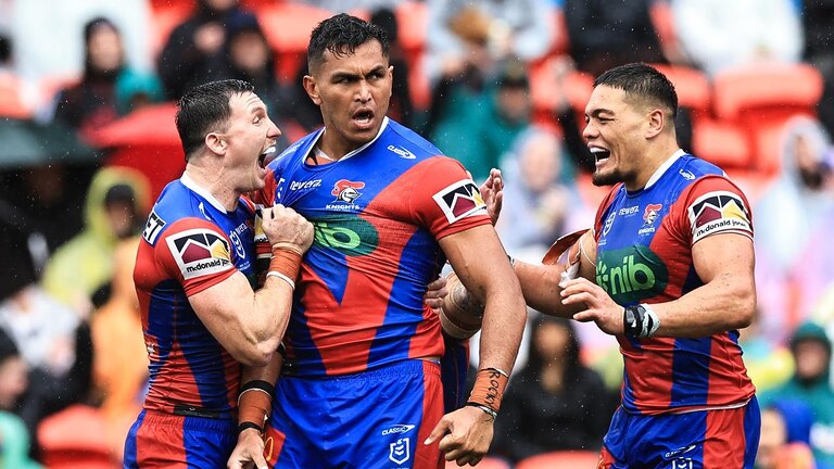 Daniel Saifiti of the Knights celebrates a try. Photo by Mark Evans/Getty Images.