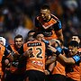 Tigers celebrate victory over the Titans in their most recent game at Leichhardt