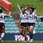 Gayle Broughton celebrates her try.