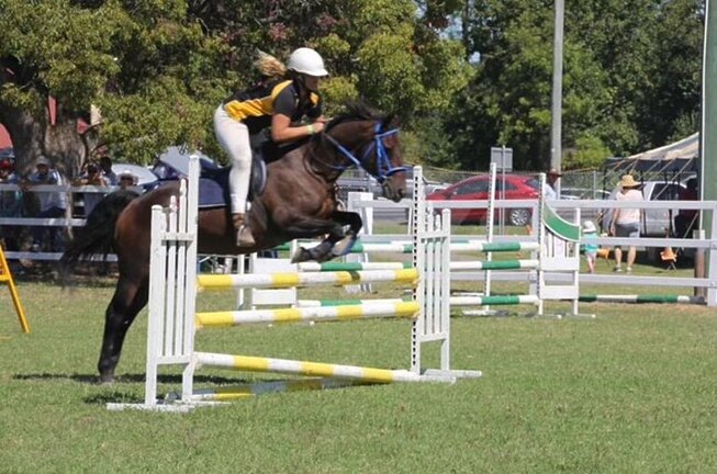 Ellie Johnston indulging her passion for show jumping.