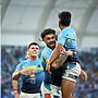 Jojo Fifita and Keano Kini celebrating after combining for one of their multiple tries against the Broncos.