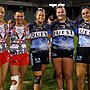 Tayla Preston (centre) with Sharks team-mates Ellie Johnston and Tegan Dymock and Dragons stars Teagan Berry and Zali Hopkins after their clash at WIN Stadium.