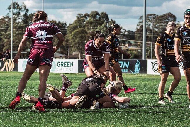 Tayla Montgomery scores against Mounties at Hinchinbrook