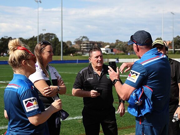 Team and match officials talk during a delay to the start of the round five NRLW match between Parramatta Eels and Newcastle Knights at Eric Tweedale Stadium. Picture: Getty Images