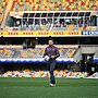 NRLW Broncos Head Coach Scott Prince on field.