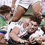 Tallis Duncan starts every match wearing headgear, but the South Sydney young gun never finishes a game with it on. Picture: Daniel Pockett/Getty Images