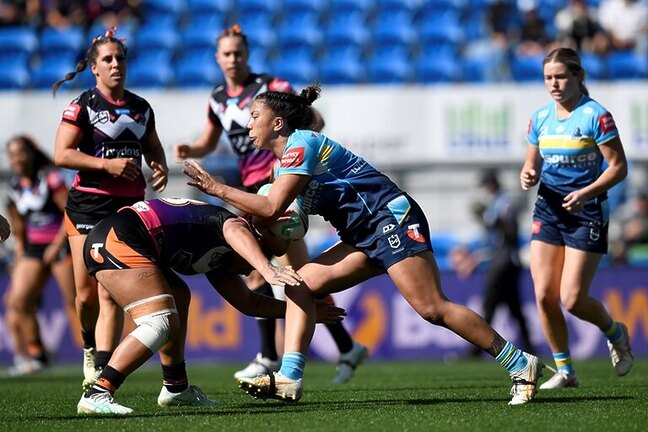 Shannon Mato charges into the Wests Tigers defence in their Round 2 match.