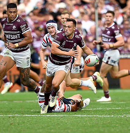 Luke Brooks splits the Roosters defence in his first game at 4 Pines Park in round two