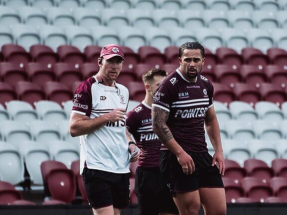 Guy Williams works with Josh Aloiai at Sea Eagles training