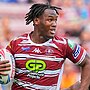 Picture by Olly Hassell/SWpix.com - 21/06/2024 - Rugby League - Betfred Super League Round 15 - Wigan Warriors v London Broncos - DW Stadium, Wigan, England - Junior Nsemba of Wigan is tackled by Sadiq Adebiyi of London