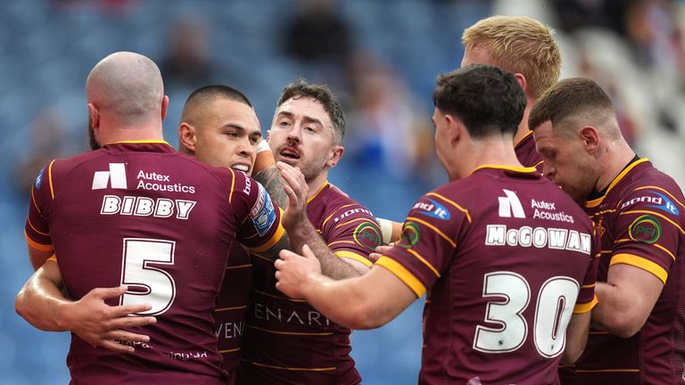 Robinson makes winning start as Huddersfield hold off Broncos