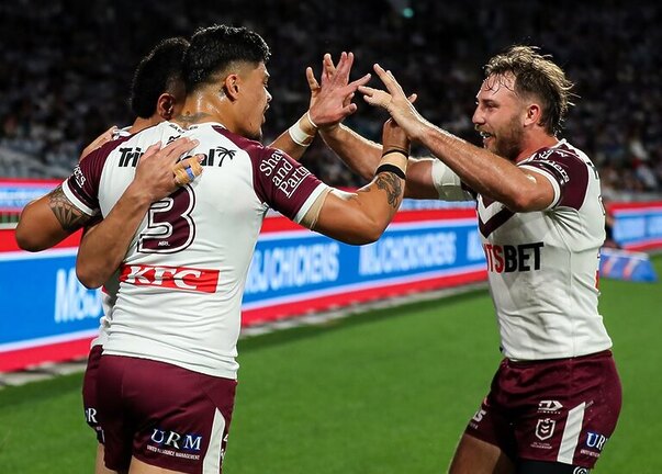 The Sea Eagles celebrate a try in their win over the Bulldogs