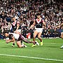 Haumole Olakau'atu dives over for his try