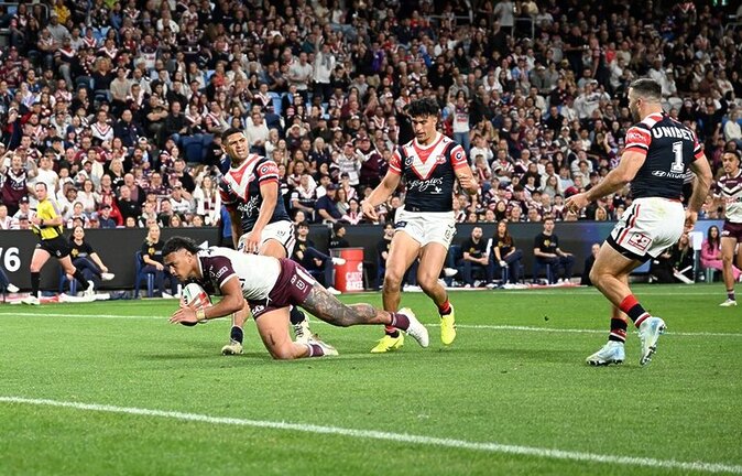 Haumole Olakau'atu dives over for his try