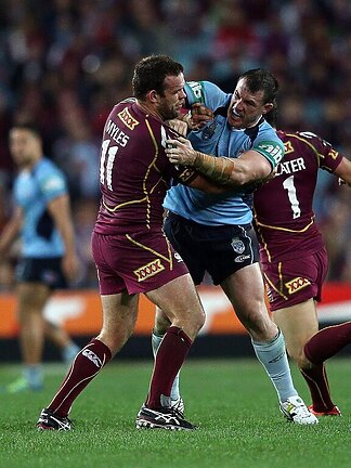 The punches that changed State of Origin - Paul Gallen (R) and Nate Myles fight during the opening match of the 2013 series.